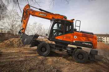 Автоматическая система смазки Экскаватора  DX 210
